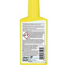 Tetra pH Minus zur Senkung des Karbonathärte in Süßwasseraquarien in einer gelben Flasche mit Gefahrensymbol.