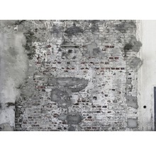 Alte Ziegelwand mit Putzresten
