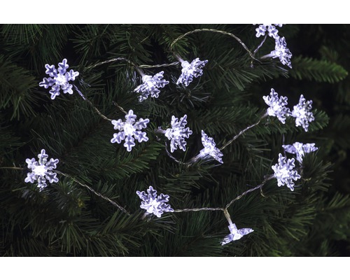 Schneeflocken Lichterkette auf einem Weihnachtsbaum
