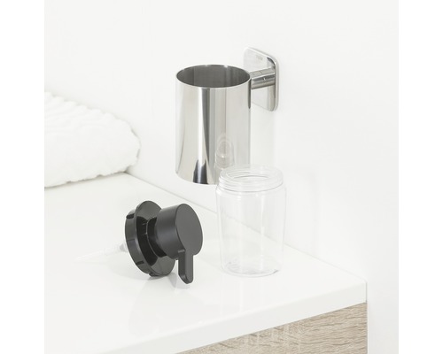 Seifenspender zur Wandmontage aus Edelstahl mit schwarzer Pumpe und durchsichtigem Behälter