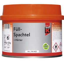 Füllspachtel inklusive Härter in einem orangefarbenen Behälter