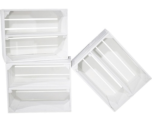 Drei weiße Holzkisten gestapelt