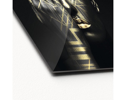 Dekoratives Glasbild mit einem Frauengesicht und goldenen Mustern