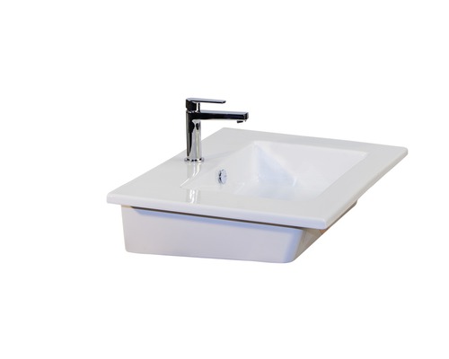 Waschtisch aus Keramik mit Armatur