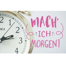 Uhr mit dem Schriftzug ''Mach ich morgen!''