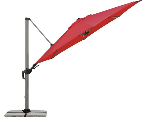 Roter Ampelschirm auf einem Betonsockel