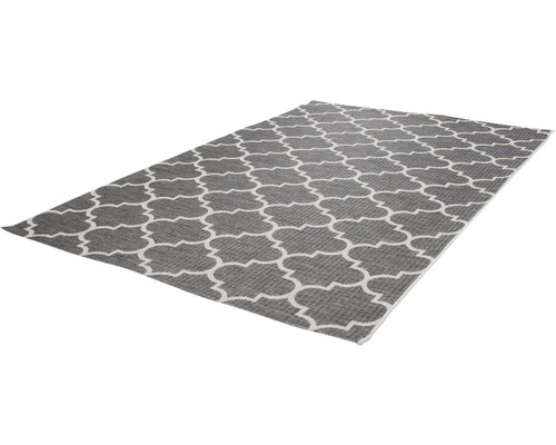 Grauer Teppich mit weißem Muster