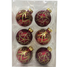 Sechs Christbaumkugeln mit goldenen Ornamenten in einer Verpackung