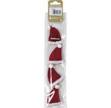 Verpackung mit vier kleinen Weihnachtsmannmützen zur Dekoration