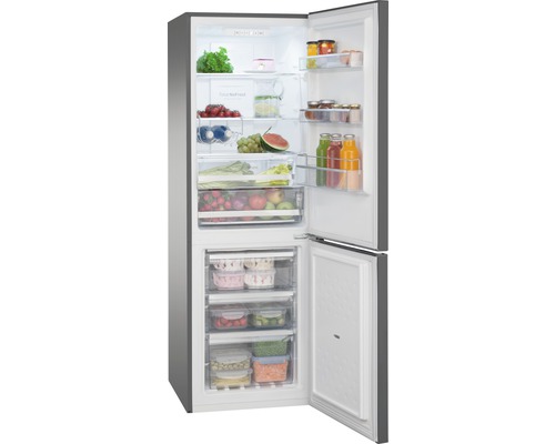 Geöffneter Kühlschrank mit Gefrierfach, gefüllt mit Lebensmitteln