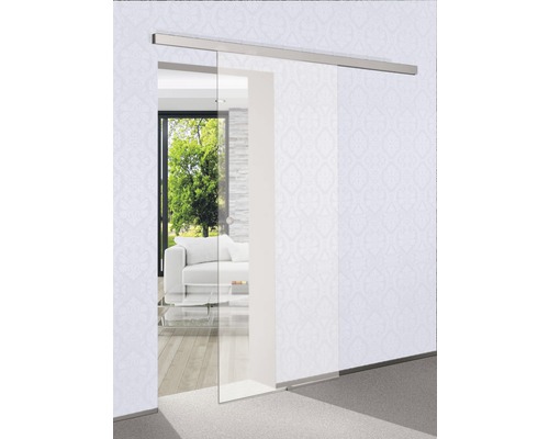 Glasschiebetür mit Metallschiene vor einer Wohnzimmerszene