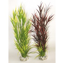 Zwei künstliche Wasserpflanzen für Aquarien, mit Steinen befestigt.