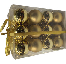 Verpackung goldene Weihnachtskugeln mit Schleife