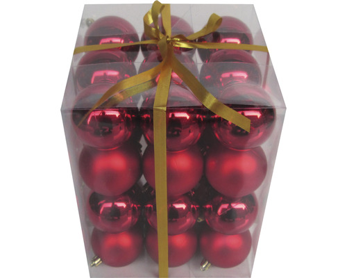Verpackung mit roten Weihnachtskugeln und Schleife