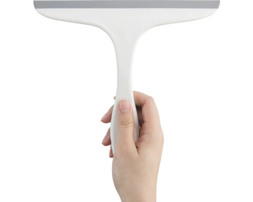 Hand hält einen Abzieher mit Griff