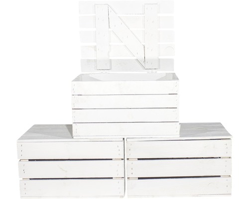 Drei weiße Holzkisten, eine mit offenem Deckel