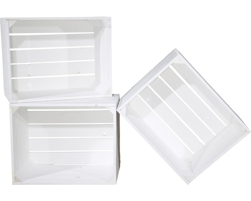 Drei weiße Holzkisten gestapelt