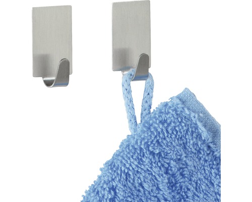 Zwei selbstklebende Haken aus Edelstahl, einer mit blauem Handtuch