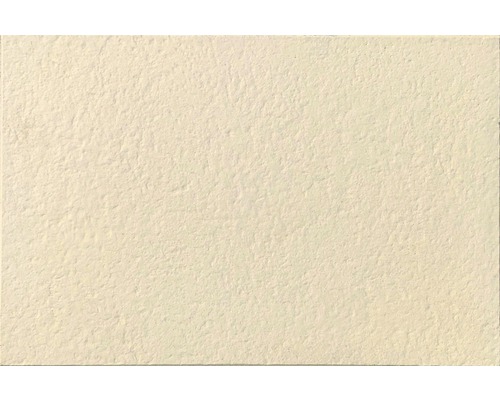 Beton Terrassenplatte Scalpellinata creme 60 x 40 x 3,9 cm Nahaufnahme einer Fliese mit unebener Oberfläche
