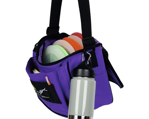 Lila Disc Golf Tasche mit Scheiben und Trinkflasche