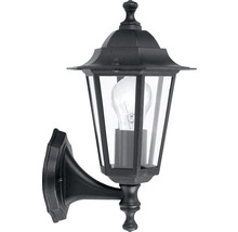 Schwarze Wandleuchte im Laternenstil mit klarem Glas und Glühbirne.