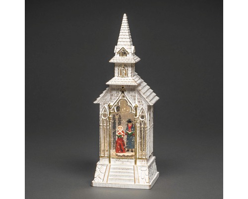 Dekorative Schneekugel in Form einer Kirche mit Sängern