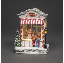 Weihnachtsdekoration: Süßwarenladen mit Weihnachtsmann und Kindern