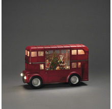 Dekorationsobjekt: Roter Doppeldeckerbus mit Weihnachtsmotiv im Inneren.