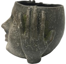Blumentopf in Form eines Gesichts, das eine Hand vor das Auge hält