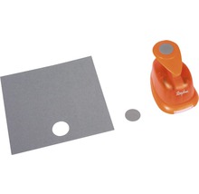 Papierstanzer mit Papier und ausgestanztem Kreis