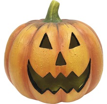 Halloween Kürbis mit geschnitztem Gesicht als Dekoration