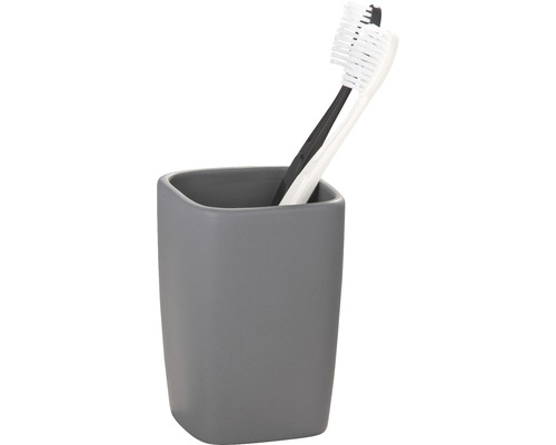 Grauer Zahnputzbecher mit zwei Zahnbürsten