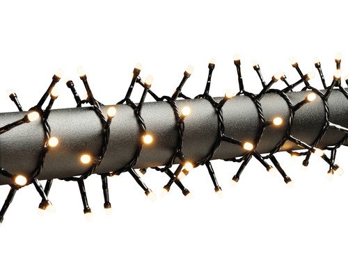 Lichterkette Weihnachtsbaum Konstsmide Micro LED Compactlights gefrostet 4,4 m + 3 m Zuleitung 200 LEDs Lichtfarbe bernstein Lichterkette mit warmweißen Lichtern um einen Pfosten gewickelt