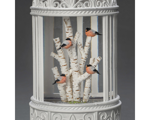 Dekorative Schneekugel mit Vogelmotiven und Birkenstämmen
