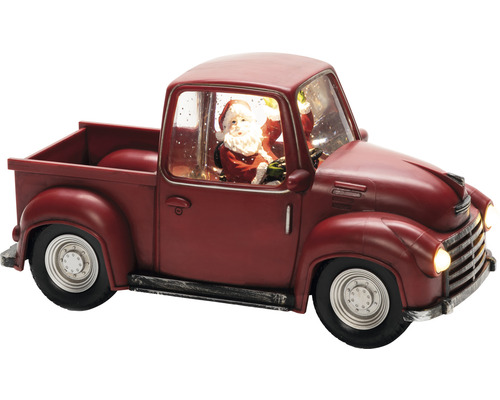 Dekorativer roter Weihnachtstruck mit Weihnachtsmannfigur