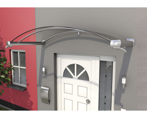 Haustürvordach aus transparentem Material mit silberfarbenen Halterungen über einer Haustür