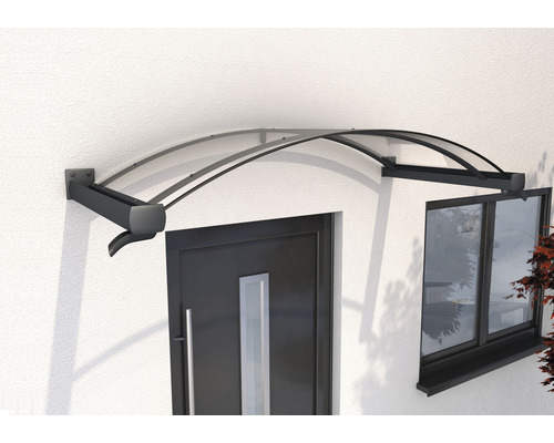 Haustürvordach aus Polycarbonat an einer Fassade über einer Tür