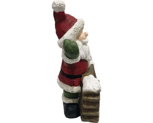 Weihnachtsmann Figur mit Leiter als Dekoration