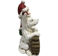 Dekofigur Weihnachtsmann mit Hund auf Holzstamm