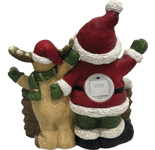 Weihnachtsdekoration mit Weihnachtsmann und Rentierfigur
