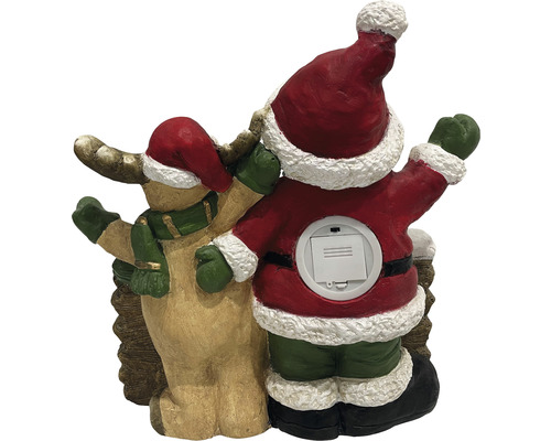 Weihnachtsdekoration mit Weihnachtsmann und Rentierfigur