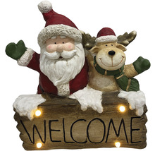 Weihnachtsdekoration mit Weihnachtsmann, Rentier und Willkommensschild