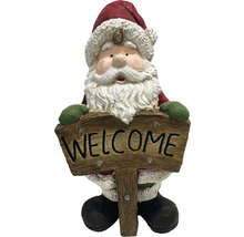 Weihnachtsmann-Figur mit Willkommensschild als Dekoration für den Außenbereich