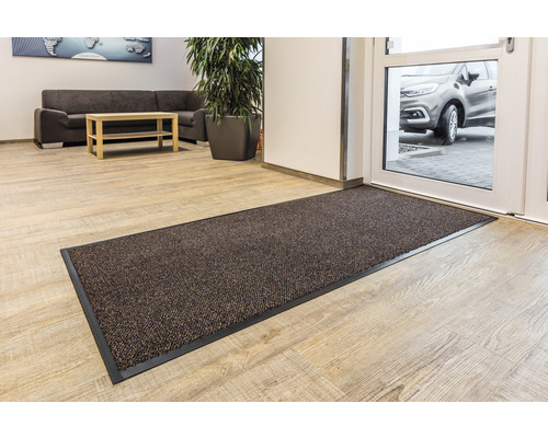 Fußmatte im Eingangsbereich eines Hauses.