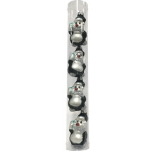 Vier Pinguin Weihnachtskugeln in einer transparenten Röhre