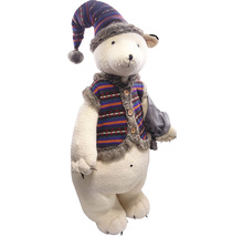 Dekorativer Teddybär mit Mütze und Weste als Weihnachtsdekoration