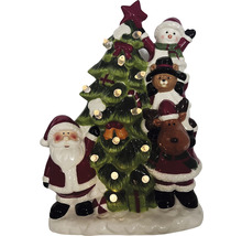 Dekorative Weihnachtsfigur mit Weihnachtsmann, Schneemann, Teddybär, Rentier und Weihnachtsbaum mit Beleuchtung.
