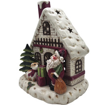 Dekorative Weihnachtshaus-Leuchte mit Weihnachtsmann, Hund und Geschenken