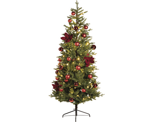 Geschmückter Christbaum mit Kugeln und Blumen