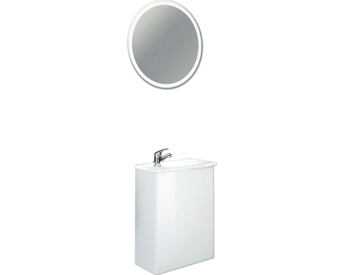 Badezimmer mit Spiegelschrank und rundem Spiegel